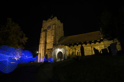 Low angle view of lit up at night