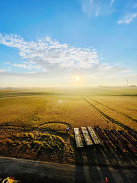 Sunrise view from a crane man basket lift overseeing a wind farm in iowa.