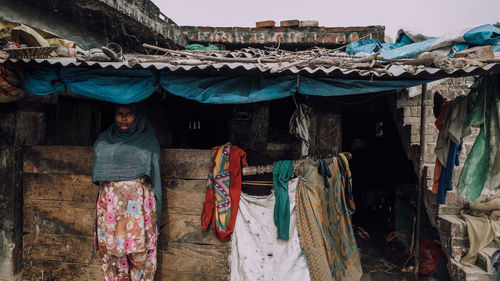 High angle view of clothes hanging at market