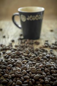 Close-up of coffee beans on table