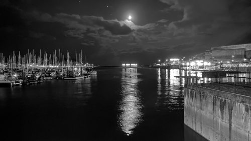 View of harbor at night