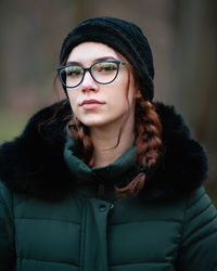 Portrait of young woman wearing sunglasses