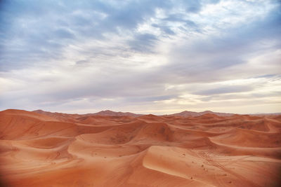 Scenic view of desert against sky