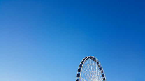 Low angle view of ferris wheel