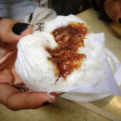 Cropped hand holding ice cream