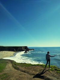 View of person standing on seashore