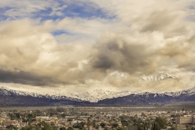 Landscape with mountain range in background