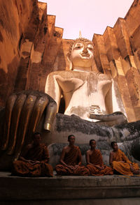 Low angle view of statues on building