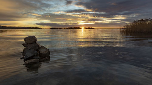 Scenic view of sea against sky during sunset