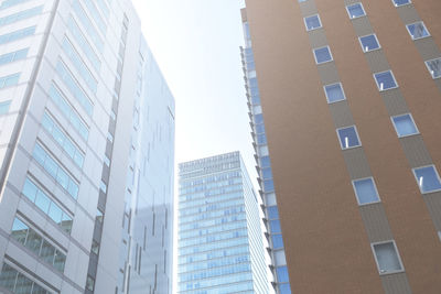 Low angle view of modern buildings against clear sky