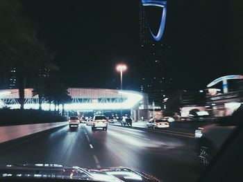 Car moving on road at night