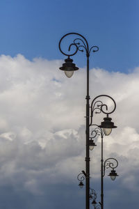 Low angle view of street light against sky