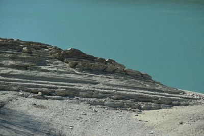 Rock formations in desert against clear blue sky