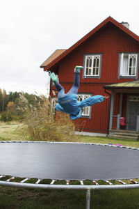 Child jumping on trampoline
