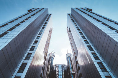 Low angle view of modern buildings against clear sky