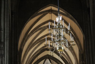 Low angle view of illuminated chandelier