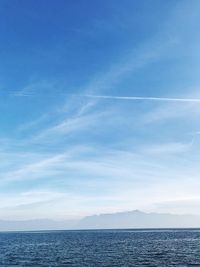 Scenic view of sea against blue sky