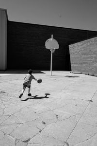 Boy playing basketball