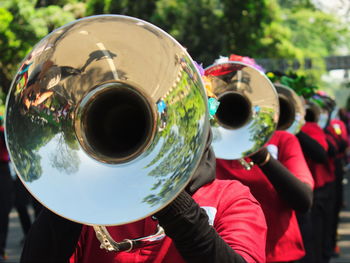 Musicians playing trumpet in parade