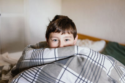 Portrait of boy at home