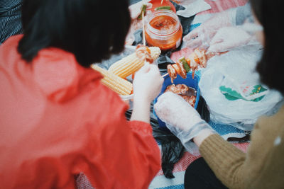 High angle view of people having food