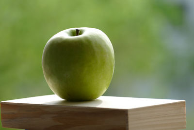 Close-up of apple on table