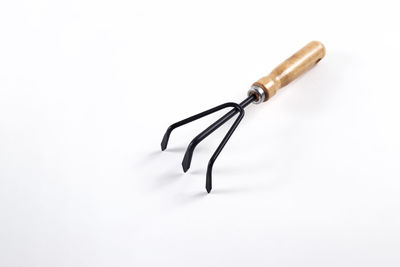 High angle view of pen on table against white background