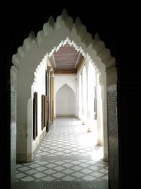 Empty white corridor in historic building