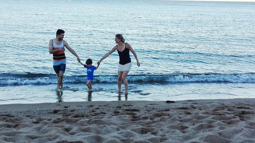 Family enjoying at beach