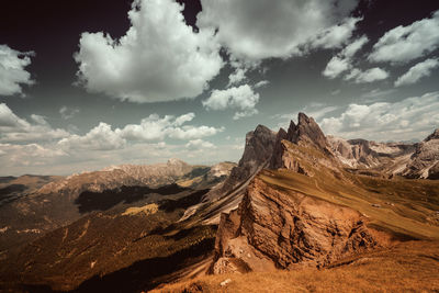 Scenic view of mountains in desert against sky