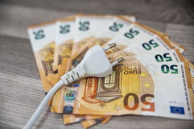 Close-up of paper currency on table