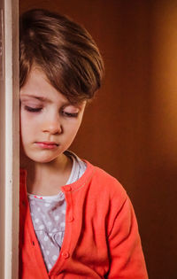 Close-up of boy looking down