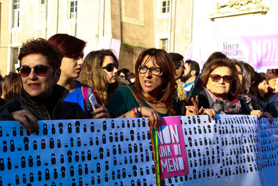 Group of people against the wall