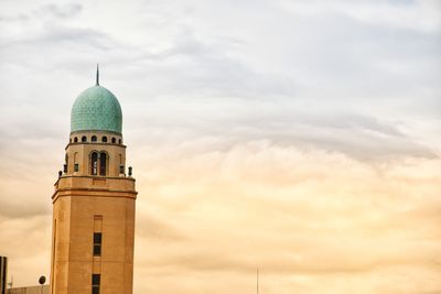 Low angle view of tower of building against sky