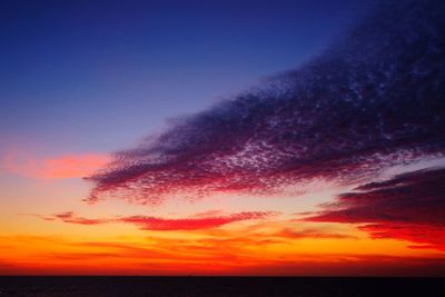 Scenic view of sea against clear sky during sunset