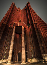 Low angle view of old building against sky