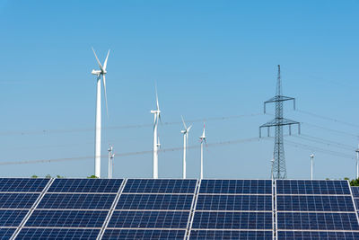 Electricity pylons, solar panels and wind turbines seen in germany