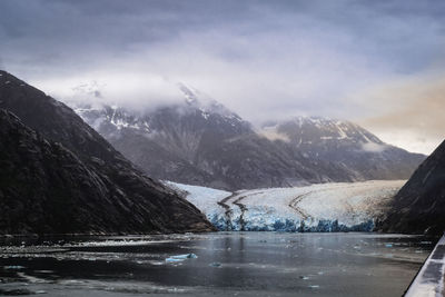 Scenic view of snowcapped mountains against sky at the dawes glacier in alaska 