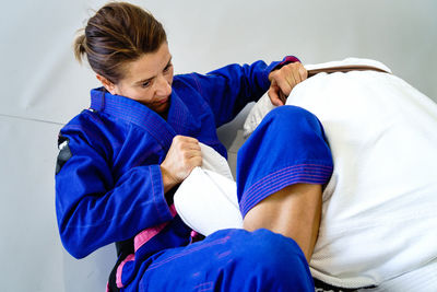 Woman lying on floor at home