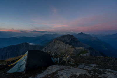 Scenic view of mountains against sky during sunset