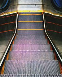 High angle view of illuminated escalator