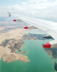 Airplane flying above the spanish main land