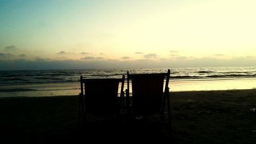 Scenic view of sea against sky at sunset