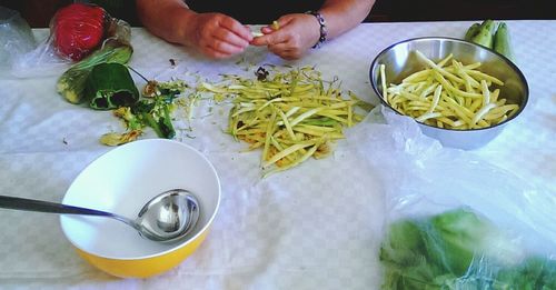 Cropped hand holding food