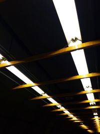 Low angle view of illuminated ceiling