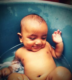 Cute baby boy in bathtub