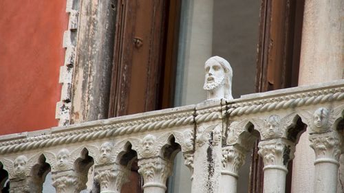 Low angle view of statue in balcony