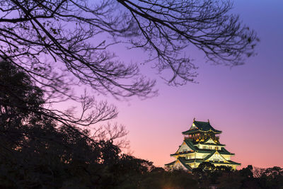 Osaka castle in evening sun light in autumn, osaka japan