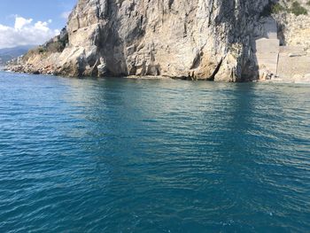 Scenic view of sea against blue sky