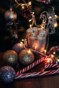 Close-up of christmas decorations on table